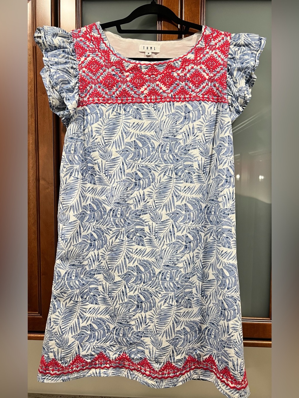 THML Blue Leaf Print Dress with Pink Embroidery at neckline and hem.